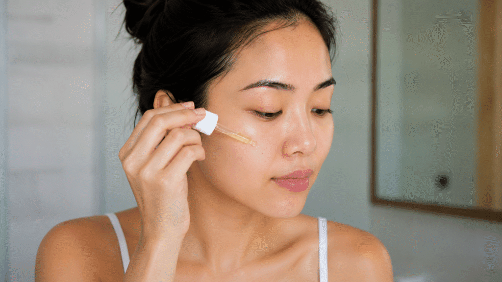 Photo of a girl applying retinol