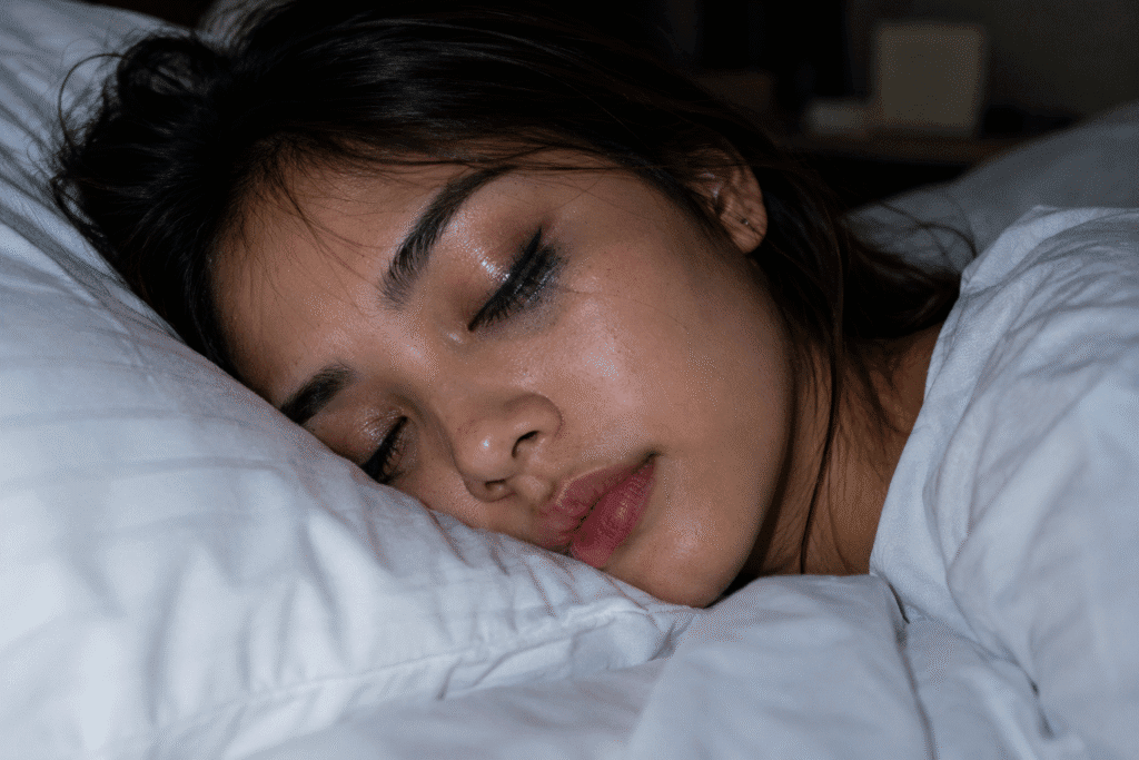 Can Makeup Cause Wrinkles? Truth About Skin Aging 2 Photo of a woman sleeping with makeup on