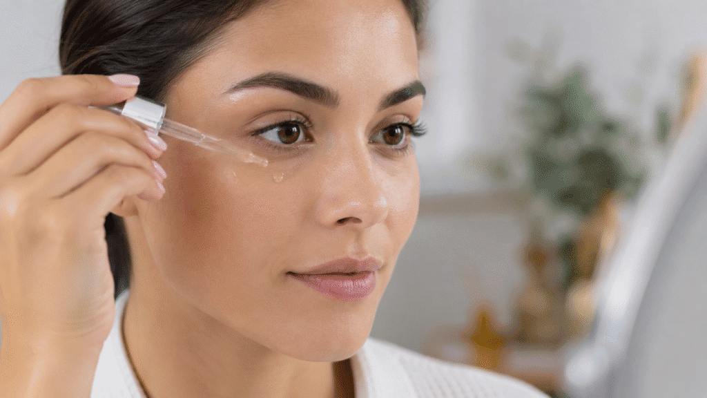 Why Is the Skin Around My Eyes Dry? 5 Woman applying serum around her eyes.