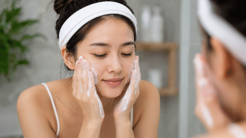 Woman gently cleansing her face